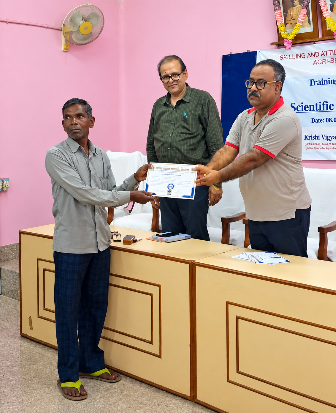 Mr. Lakhiram Singh Mura receiving a training certificate during livestock management training at KVK, Kalyan, Purulia